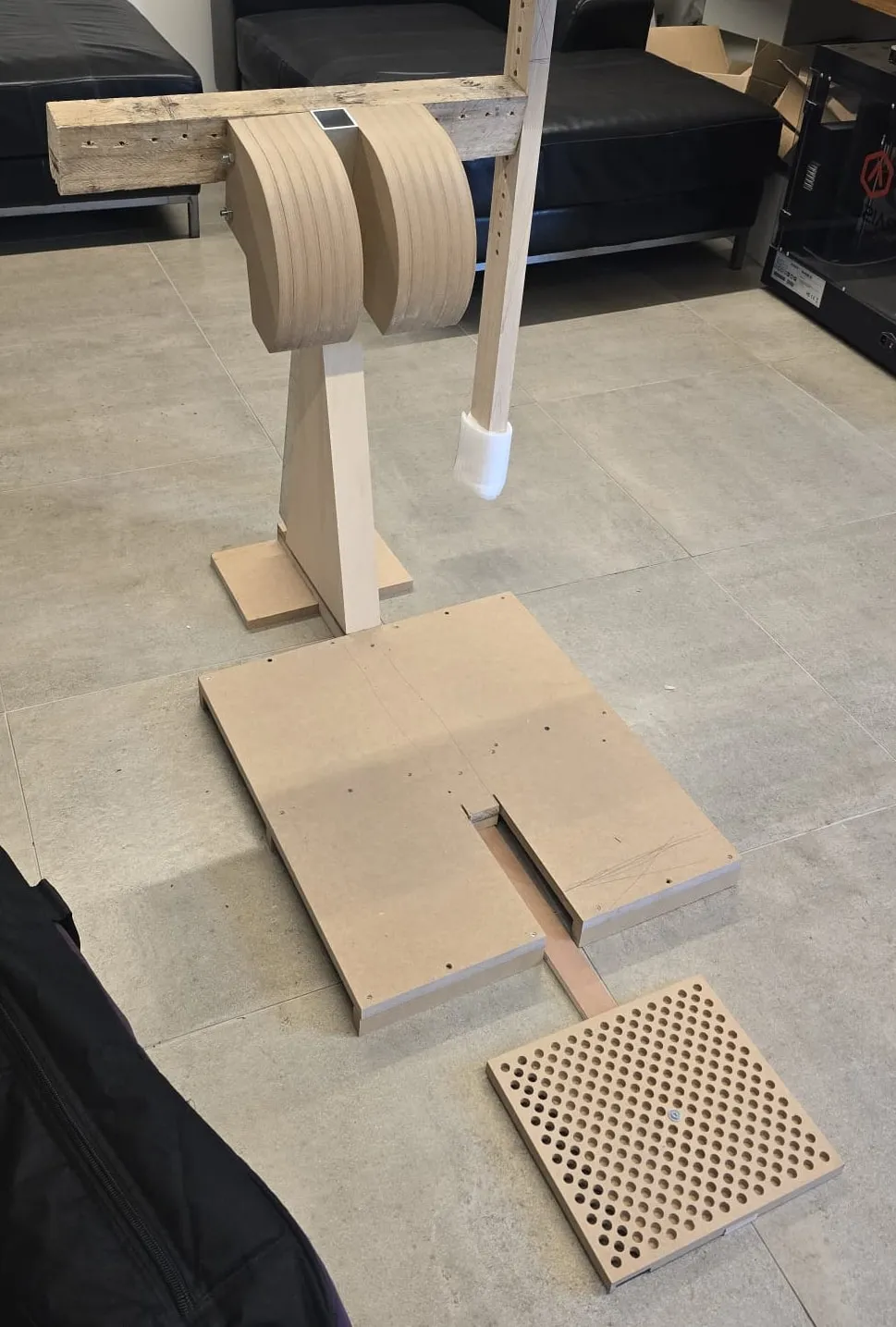 Full-scale wooden prototype in a workshop