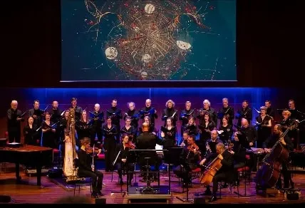 José playing a Trinity prototype with the orchestra 14