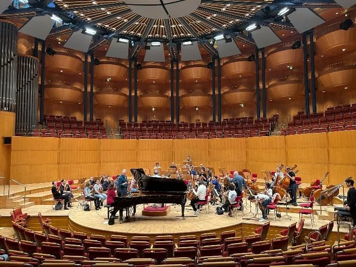 José playing a Trinity prototype with the orchestra 15